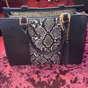 Black purse with snakeskin print center